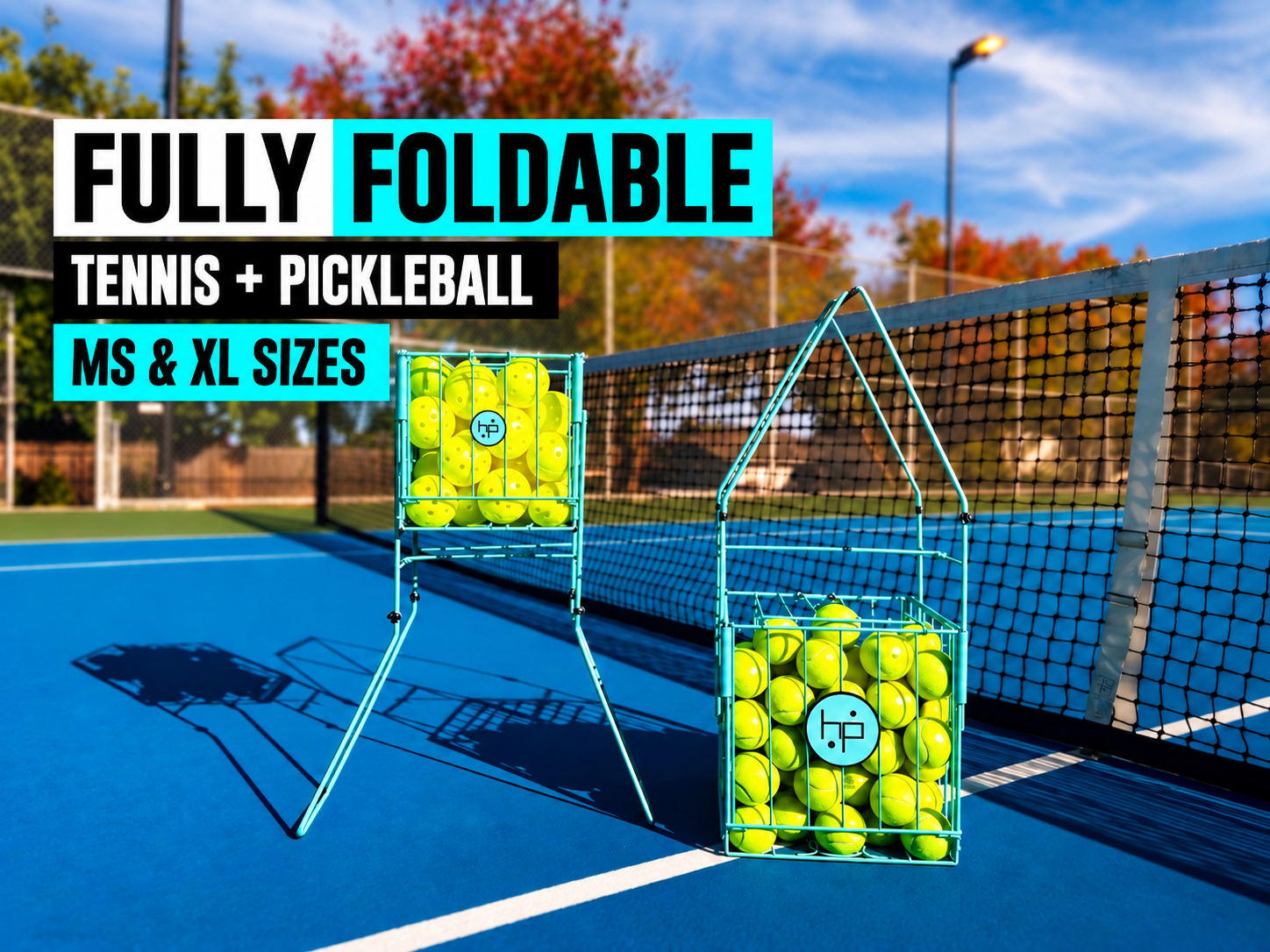 Fully foldable BallHP MS and XL hoppers for tennis and pickleball, standing at the net on a blue hard court